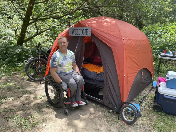 bob-vogel-in-front-of-tent-and-camping-cot1.jpeg